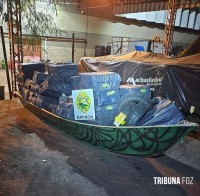 BPFRON apreende embarcação carregada com cigarros contrabandeados e pneus em Itaipulândia