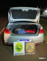 BPFRON e PF prende paraguaio e brasileira com 178 Kg de maconha em Santa Tereza do Oeste BPFRON e PF prende paraguaio e brasileira com 178 Kg de maconha em Santa Tereza do Oeste