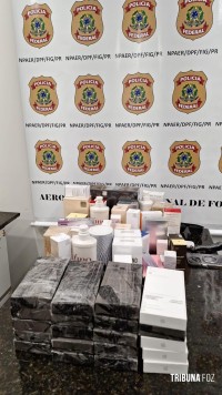 Policia Federal prende passageiro com carga de celulares e perfumes descaminhados no Aeroporto de Foz do Iguaçu Policia Federal prende passageiro com carga de celulares e perfumes descaminhados no Aeroporto de Foz do Iguaçu